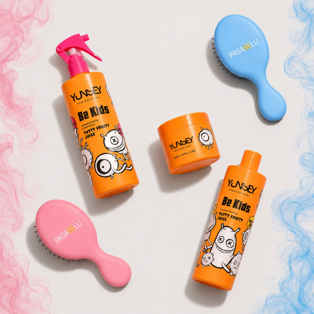 Champú, acondicionador y cera capilar Yunsey Be Kids Tutty Fruity Juice en envases naranjas.