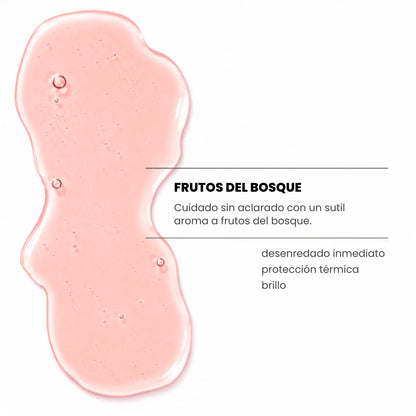 Producto capilar en textura gel de color rosa, con aroma sutil a frutos del bosque. La imagen destaca sus beneficios: desenredado inmediato, protección térmica y brillo.